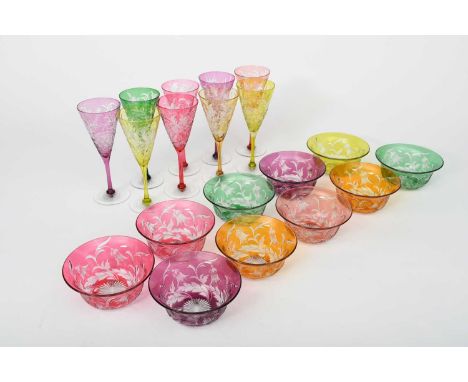 A Stevens and Williams intaglio cased glass service, comprising ten glasses and nine finger bowls, each overlaid in yellow, o
