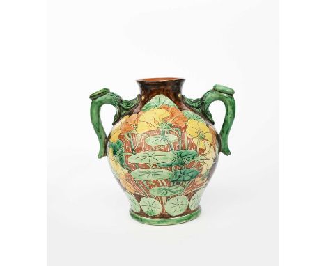 An Art Nouveau Della Robbia Pottery vase by Ruth Bare, dated 1900, shouldered ovoid form with applied fish handles, incised a