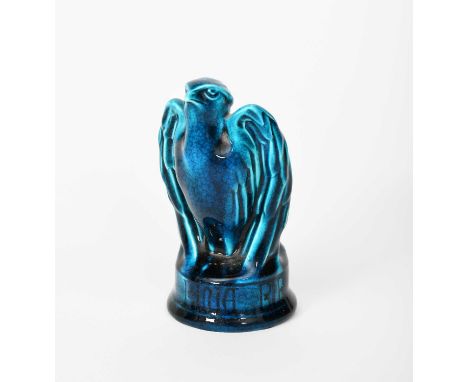 A Bernard Moore model of an eagle, on circular base inscribed The Binia Bird, glazed blue, signed Bernard Moore, repair to ba