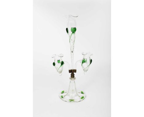 An English glass epergne probably Stuart & Sons, clear glass tapering cylindrical base with brass mount, with tall central tw