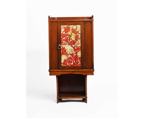 A Liberty & Co mahogany wall cabinet, set with Maw & Co lustre two tile panel, painted with foliage in ruby and copper lustre