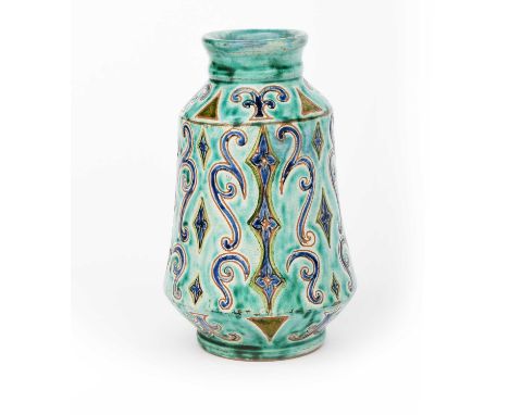 A Della Robbia Pottery vase by Gertrude Russell, shape no.211, shouldered, waisted cylindrical form, incised with columns of 