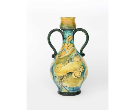 An Art Nouveau Della Robbia Pottery large Algerian vase possibly by May Furniss, painted with water marigold flowers and foli