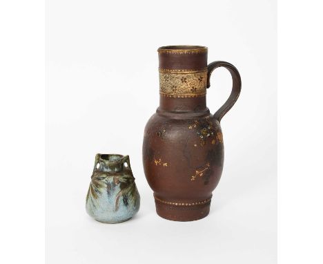 A Haviland & Cie Japoniste ewer by Ernest Chaplet, slender, shouldered form, incised with butterflies flying past fruiting tr