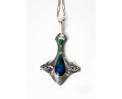 A William H Haseler silver and enamel pendant designed by Archibald Knox, central panel flanked with pierced and cast Celtic 
