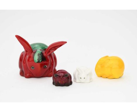 A Bernard Moore flambe model of a rabbit, flambe with green glazed patch, applied glass eyes, a Royal Worcester rabbit netsuk