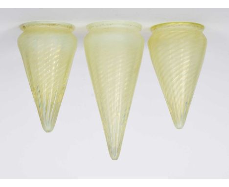 A set of three vaseline glass shades made for a WAS Benson lamp, probably James Powell & Sons, tapering conical form, interna