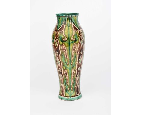 A Della Robbia Pottery vase by Cassandia Annie Walker, slender, shouldered form, painted with columns of stylised Art Nouveau