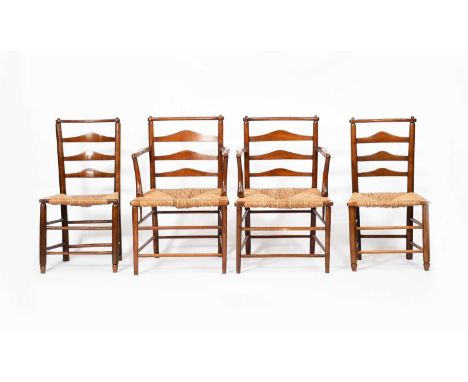 A set of two oak armchairs and two chairs designed by Charles Robert Ashbee, probably manufactured at the Guild of Handicraft
