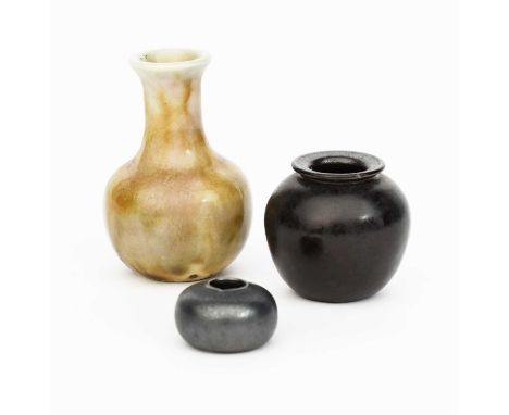 A Martin Brothers miniature gourd vase by Edwin & Walter Martin, compressed form covered in a chestnut glaze, a Martin Brothe
