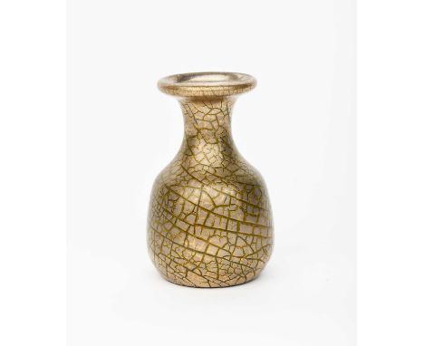 A Sunflower Pottery vase by Sir Edmund Elton, shouldered, ovoid form with flaring neck, covered in a crackled golden glaze ov