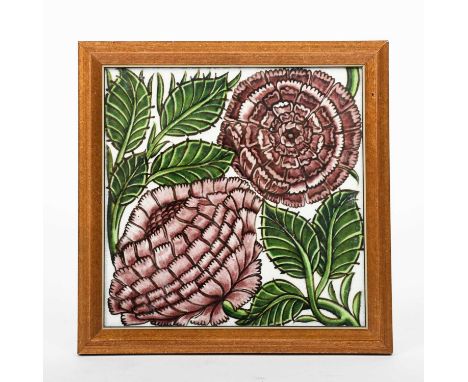 A William De Morgan Chelsea Period large tile, painted with two flowers in aubergine and green on a white ground, framed, imp