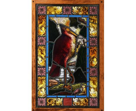 An Aesthetic Movement stained glass window the design attributed to George Edward Cook, rectangular, decorated with a crane s