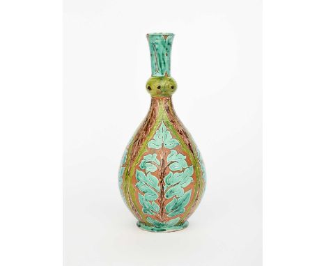A Della Robbia Pottery Tall Persian vase by Annie Jones and Harry Fletcher, ovoid with knopped, garlic neck, incised with col