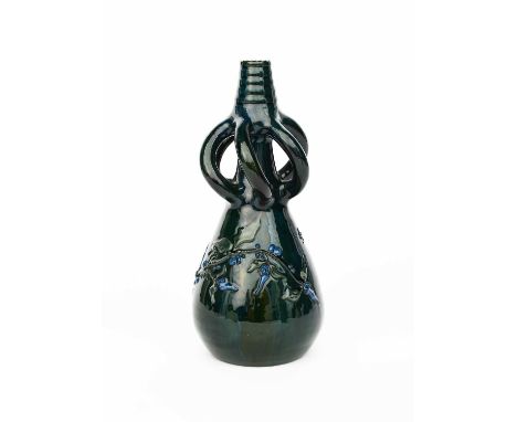A Sunflower Pottery solifleur vase by Sir Edmund Elton, tapering ovoid form with scroll neck, applied flower motif, in blue o
