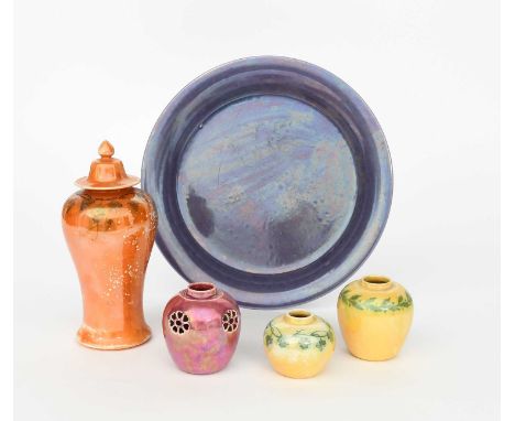 A Ruskin Pottery stoneware large platter, dated 1915, circular, covered in a lavender lustre glaze, a Ruskin Pottery vase and