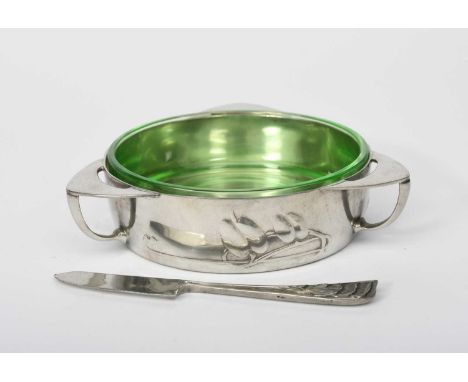 A Liberty & Co Tudric Pewter butter dish designed by Archibald Knox, model no.0162, with green glass liner, cast in low relie