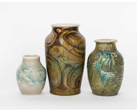 A Pilkington's Royal Lancastrian vase by Richard Joyce, shouldered form, modelled in low relief with fish, glazed blue and tu