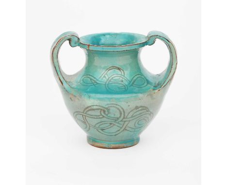 A small Della Robbia Pottery twin-handled urn vase possibly by George Seddon, shouldered form with two pulled handles, incise