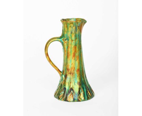 An Art Nouveau Zsolnay Pecs ewer, waisted, ribbed cylindrical form, covered in a green and golden lustre glaze, impressed Zso