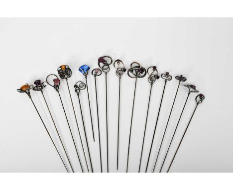 A Charles Horner silver hat pin, entwined silver terminal set with amethyst thistle flower, and fourteen other similar hat pi