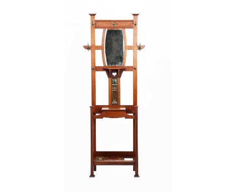 A Shapland & Petter mahogany hall stand, the back with copper Art Nouveau foliate panel set with enamel flower, shaped mirror