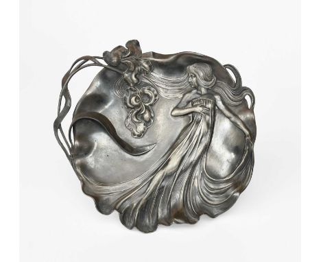 An Art Nouveau WMF pewter tray, model no.290, pierced and cast in low relief with an Art Nouveau young maiden with long flowi