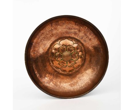 A Hart &amp; Huyshe Guild of Handicraft copper bowl, circular with repousse hammered Tudor rose, on hammered ground, stamped 