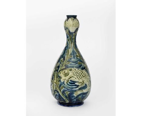 'Carp' a rare James Macintyre & Co vase by William Moorcroft, ovoid with knopped neck, tubeline decorated with three Carp fis