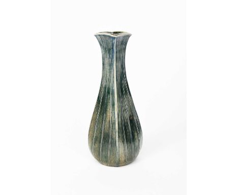 A Martin Brothers stoneware gourd vase by Edwin and Walter Martin, dated 1898, swollen square section, incised vertical veins