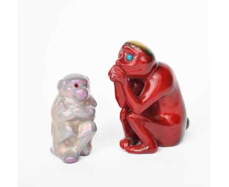 A model of a seated monkey probably Bernard Moore, modelled with hands raised to its mouth, covered in a flambe, and another 