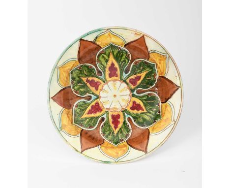 A Della Robbia Pottery plate by Ruth Bare and Annie Beaumont, incised and painted with radiating dog rose and foliage design 