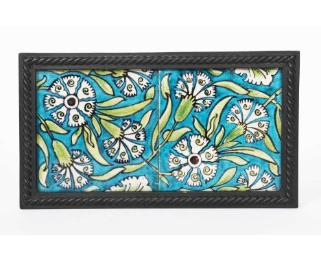 A pair of William De Morgan Moffat tiles, on Poole blanks, painted in shades of blue and green on a white ground, framed, unm