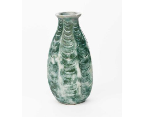 A Martin Brothers stoneware vase by Edwin and Walter Martin, slender, ribbed form, covered in a green and blue glaze, incised