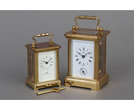 2 Matthew NORMAN (Swiss Made) Reiseuhren - eckige Messinggehäuse in Form einer Stutzuhr (¨bracket-clock¨) mit beweglichem Büg