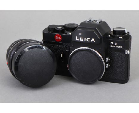 LEICA R3 Electronic Spiegelreflex-Kamera mit Fisheye Elmarit-R (1:2.8/16) Objektiv - wohl um 1980, dazu 1 Braun Hobby 23BC Bl