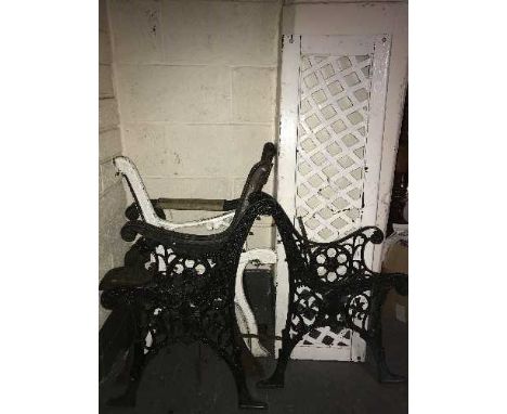 Four sets of cast iron bench ends and a bench back 