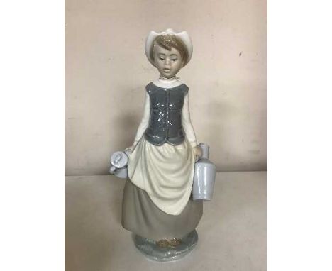A Lladro figure of a milkmaid