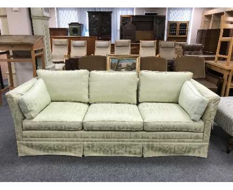 A three seater settee in green classical print 