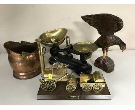 A set of vintage kitchen scales, weights, miniature brass coal bucket, wooden figure- Eagle and brass model of Stevenson's ro