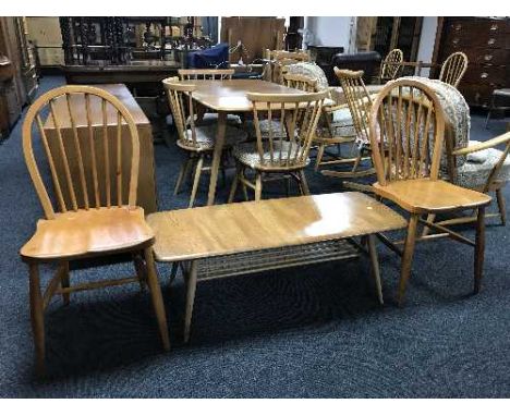 An elm Ercol coffee table and a pair of Ercol kitchen chairs 