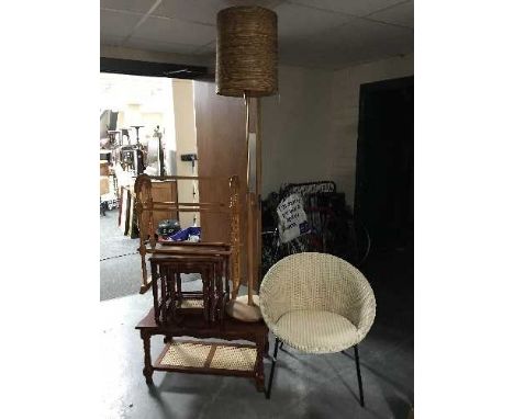 A wicker basket chair, teak standard lamp, pine towel rail, nest tables and coffee table 