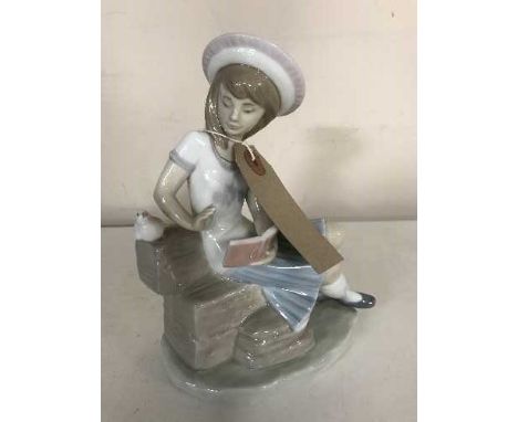 A Lladro figure - Sunday's child numbered 6024 