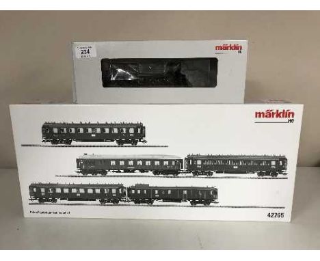 A Marklin 37960 steam locomotive together with a  42765 Express Train Passenger Car Set (HO Scale), boxed 