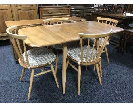 A six-piece elm Ercol dining room suite 