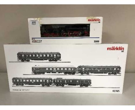 A Marklin 33099 steam locomotive together with a  42765 Express Train Passenger Car Set (HO Scale), boxed 