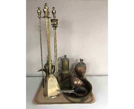 A tray of antique brass and copper ware, brass teapot, companion set, small copper pan etc 