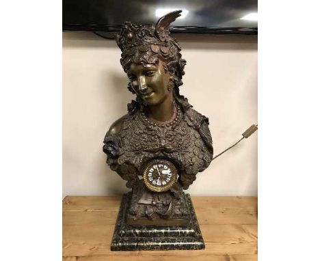A patinated figural mantel clock with enamel dial, height 72cm