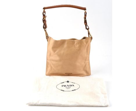 PRADA 1990s light tan square leather bag with baby blue leather lining. With gold coloured hardware and care card and dust ba