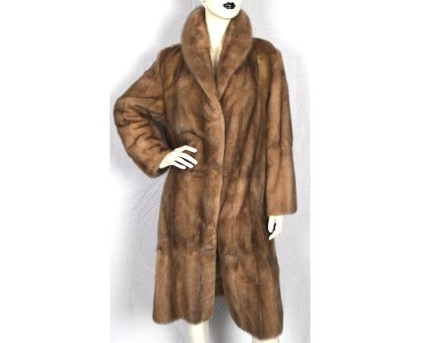 A sot grey/beige mink fur coat with coffee satin lining two hip pockets and fastens with fur hooks. (Shoulder to hem 110cm) F